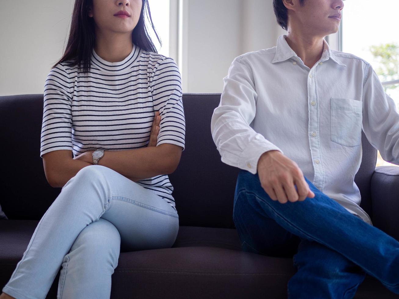 Asian women mourn and become irritated by their husband's behavior. After an argument and causing pain in the heart. Angry and not understanding each other, resulting to divorce photo
