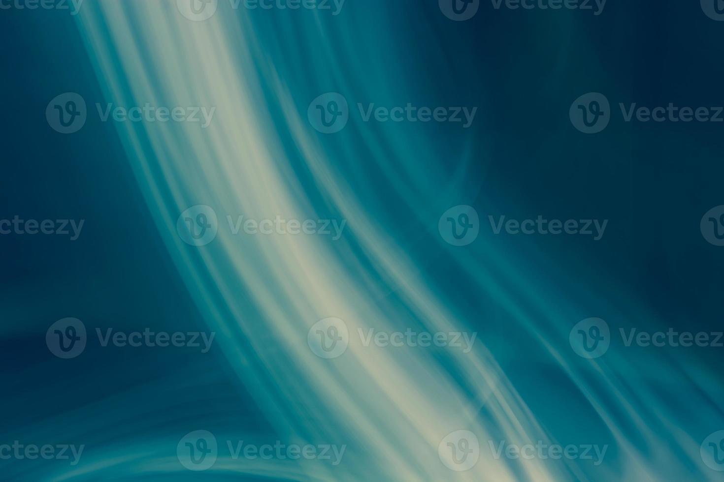 Abstract background in blue turquoise tones with waves and haze photo