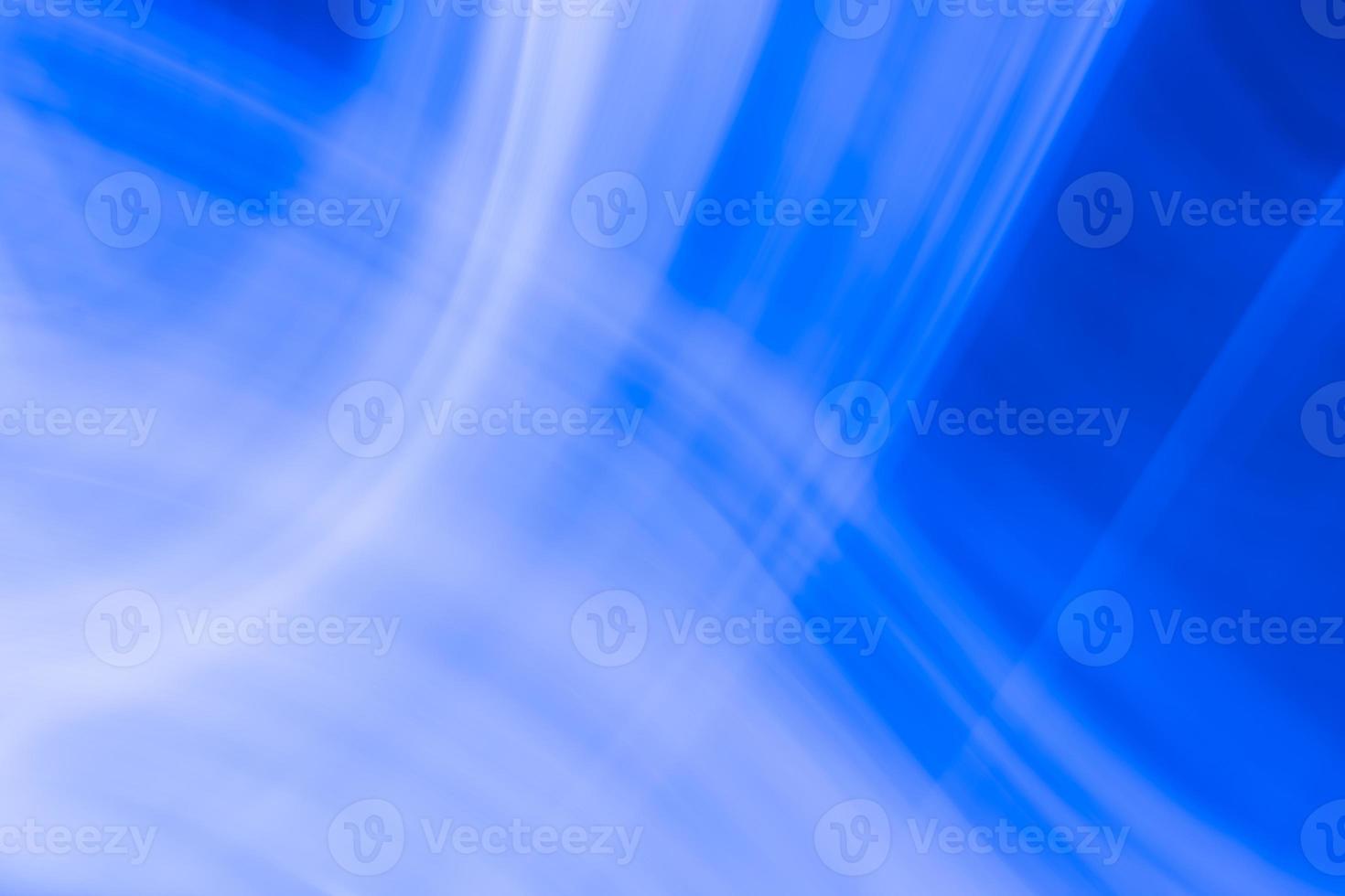 abstracción de ondas blancas de tenca sobre un fondo azul foto