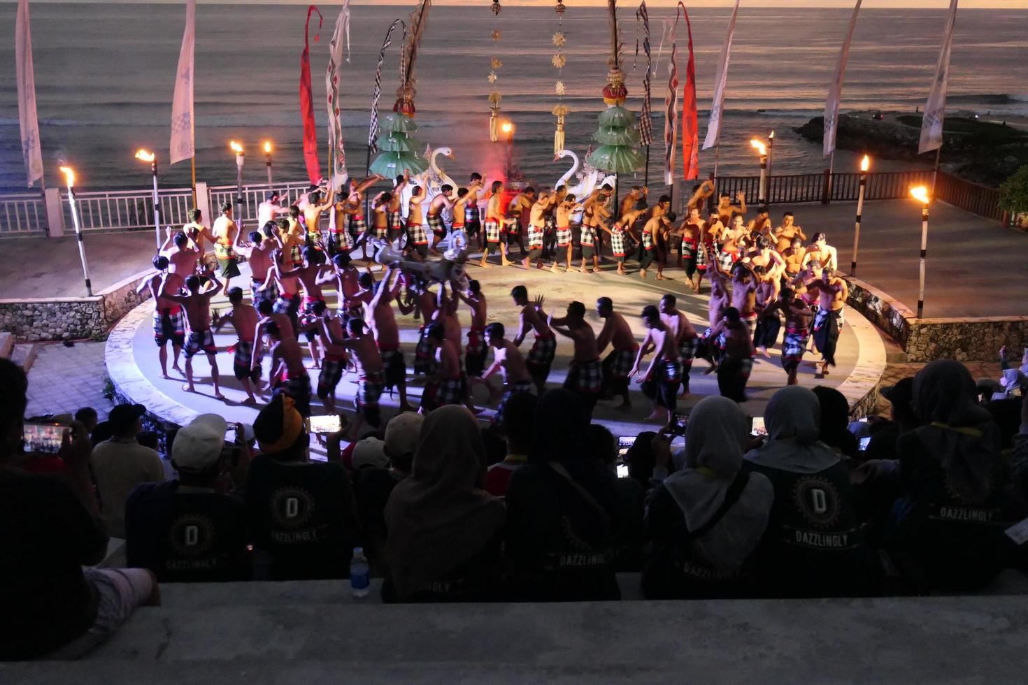 Kecak dance performance on Melasti Beach, bali, Indonesia photo