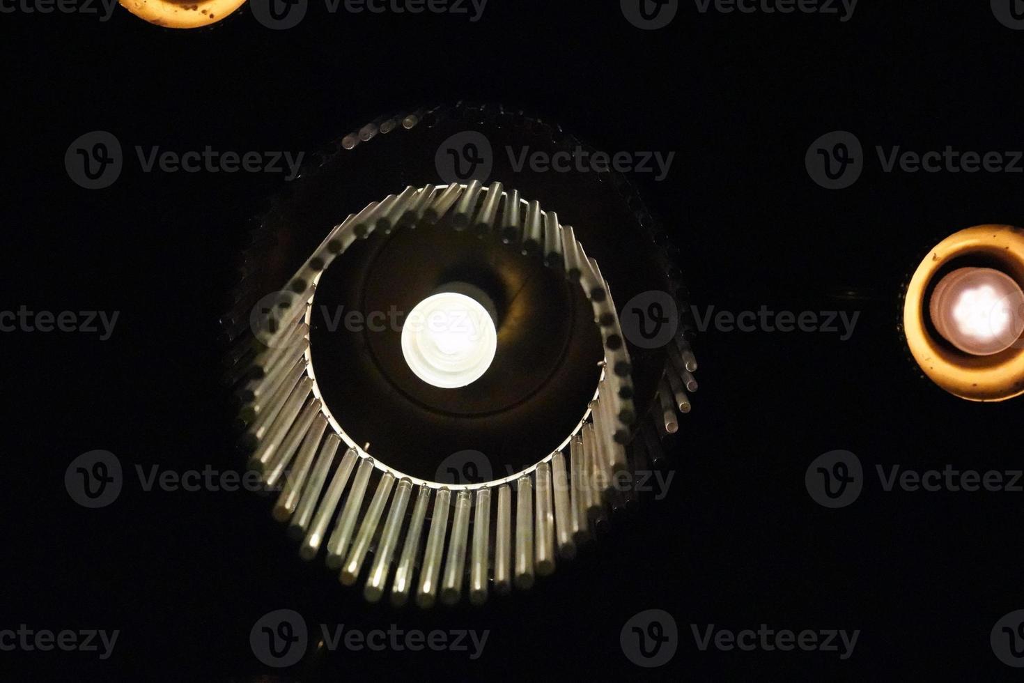 old liberty lamp isolated on black photo