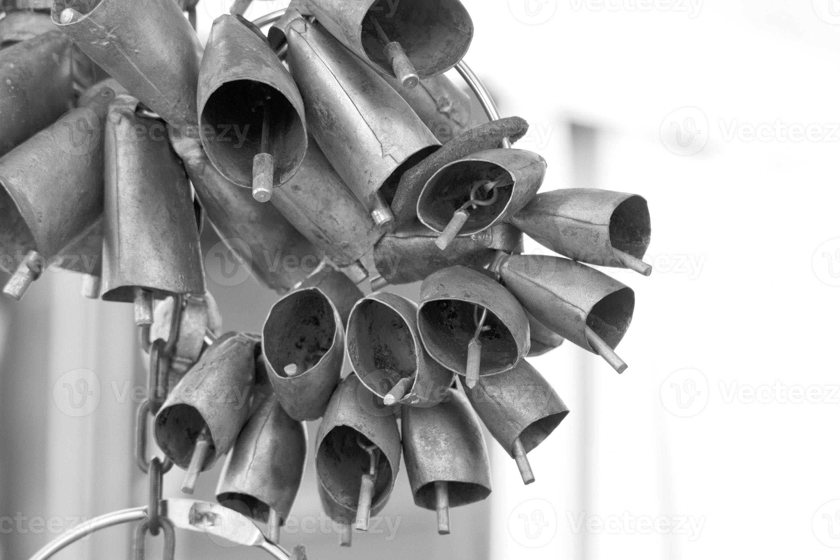 cow bells hanging from display stand 17362058 Stock Photo at Vecteezy