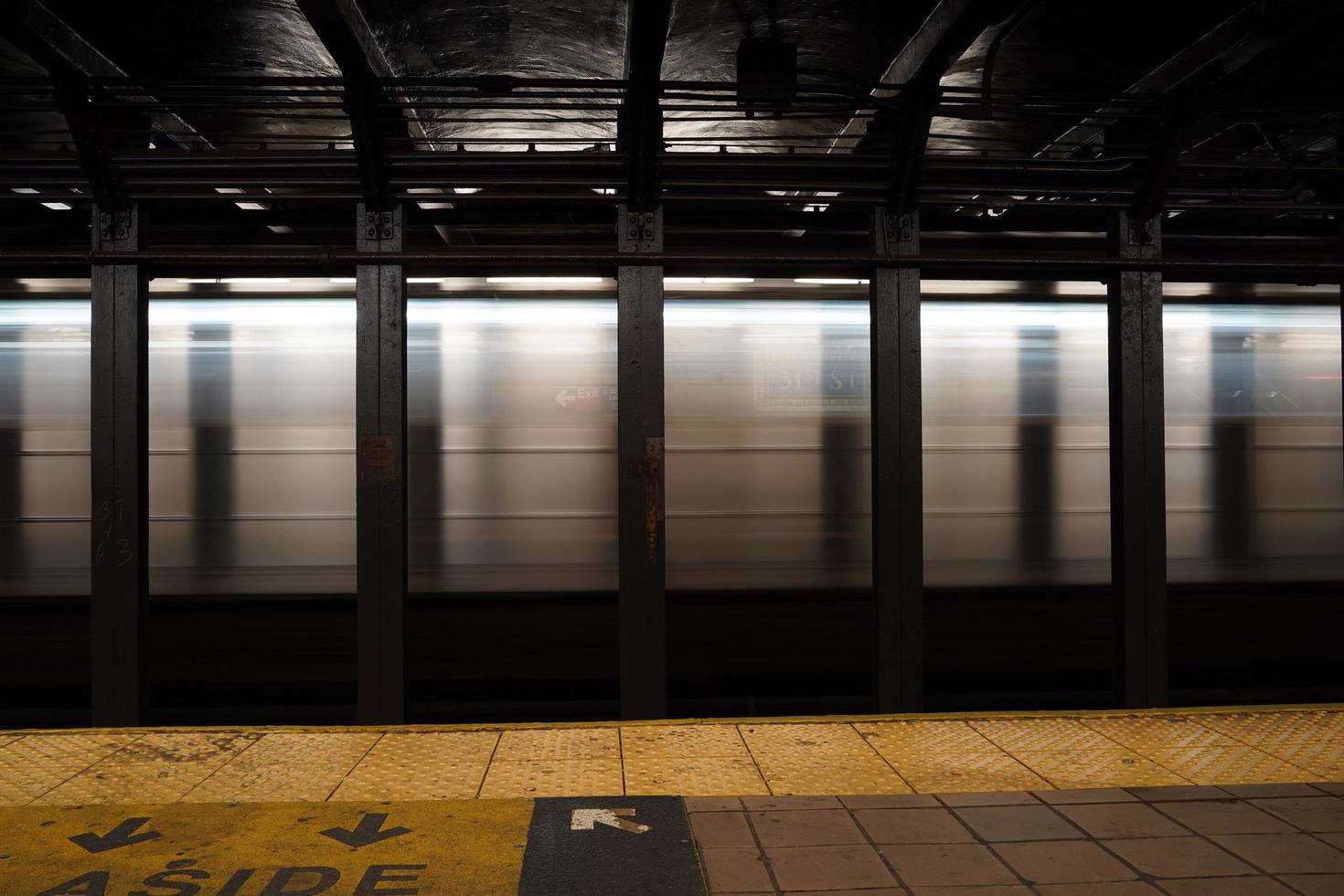 New york city subway moving train at 51 st station, 2022 photo