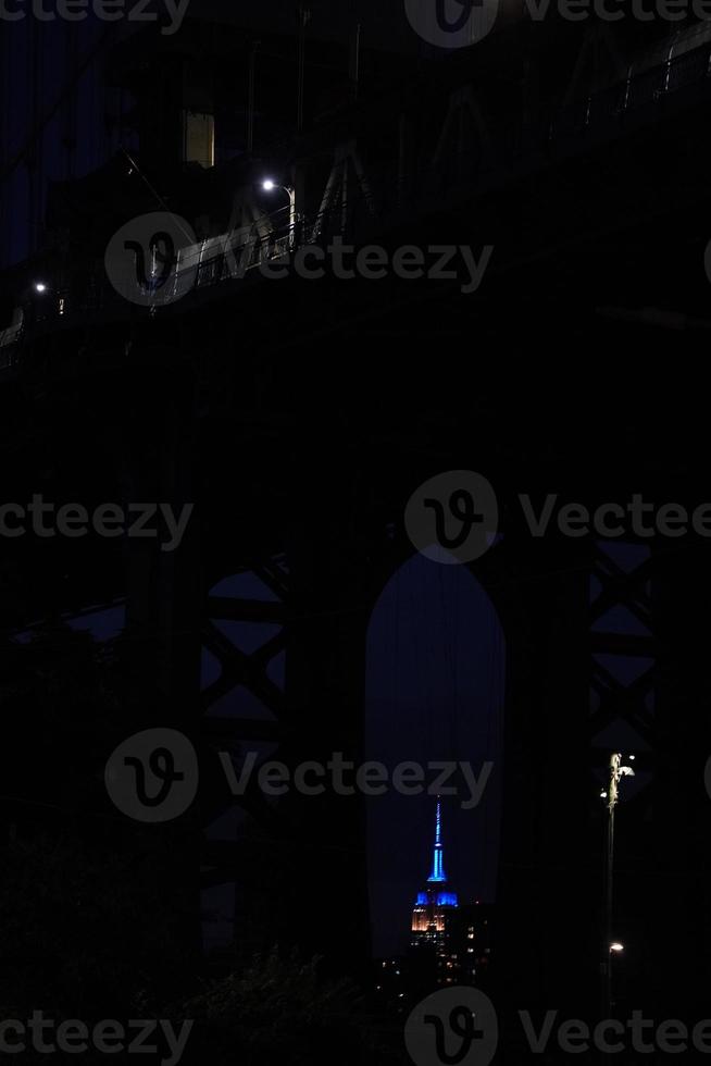 empire state building new york city night view from dumbo photo