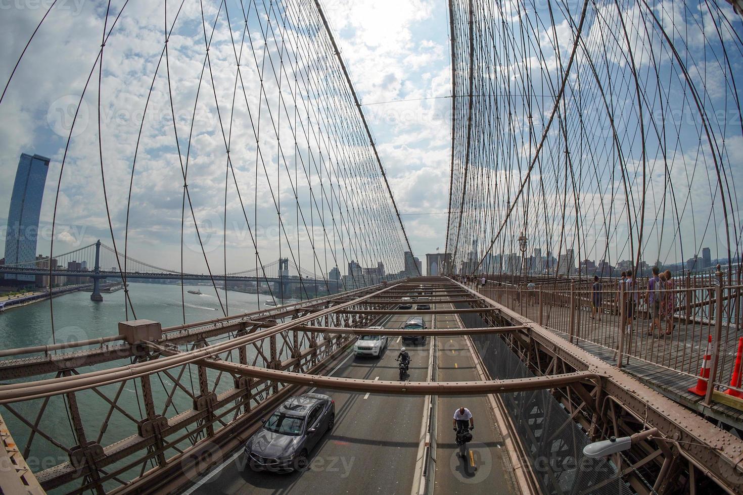 brooklyn bridge moving traffic new yok photo