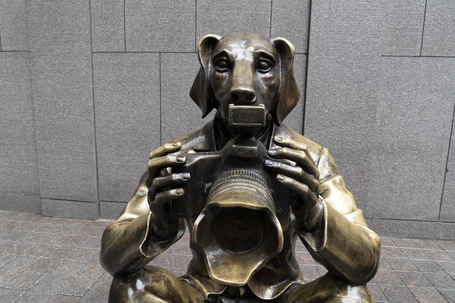 NEW YORK, USA - MAY 5 2019 -  Dog and bunny photographer statue photo