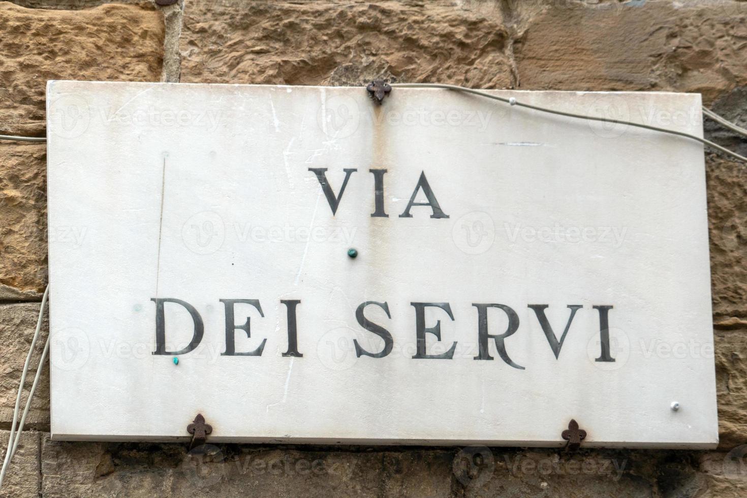 calle de esclavos de florencia letrero de mármol foto