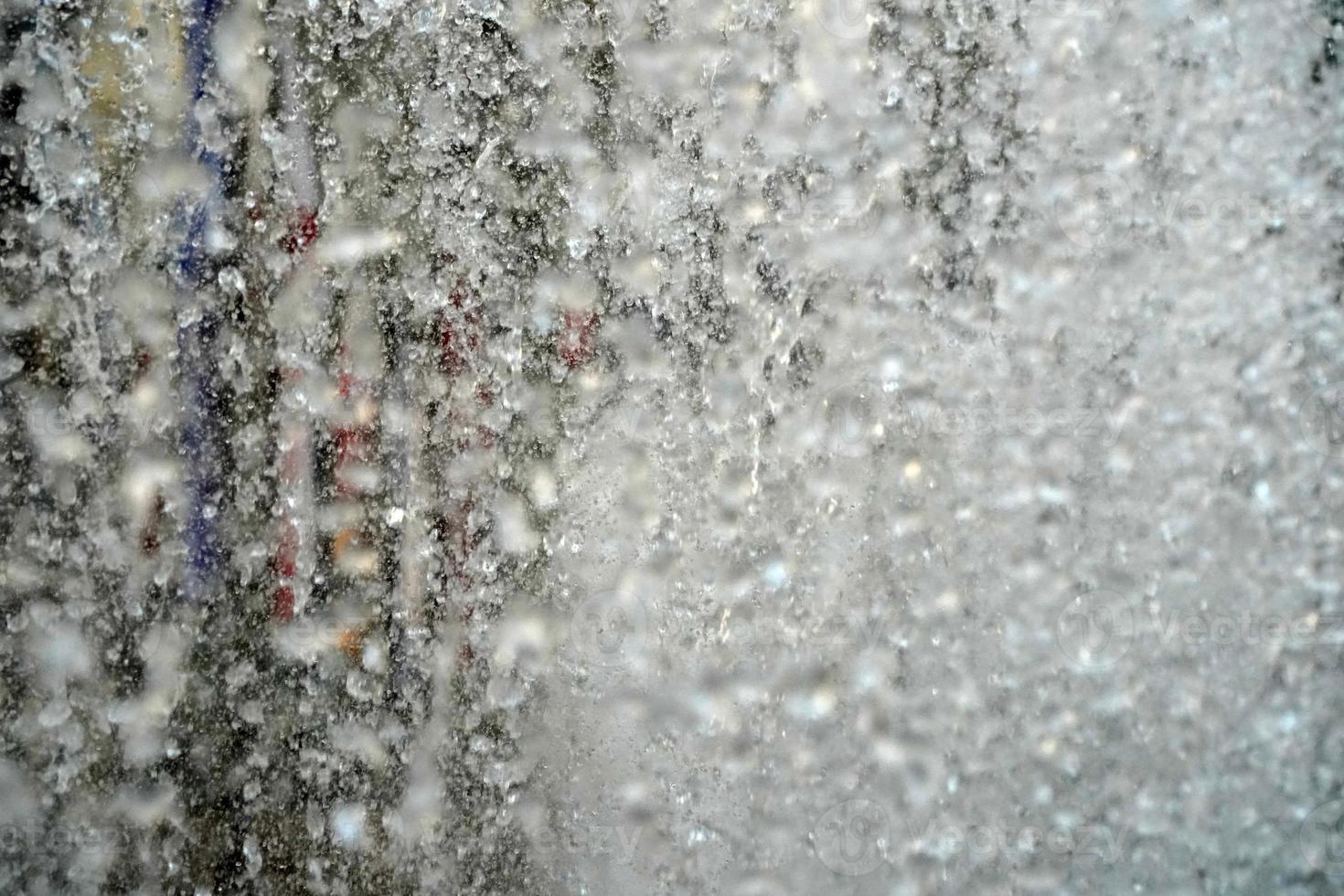 people inside rockfeller center fountain splash in new york manhattan photo