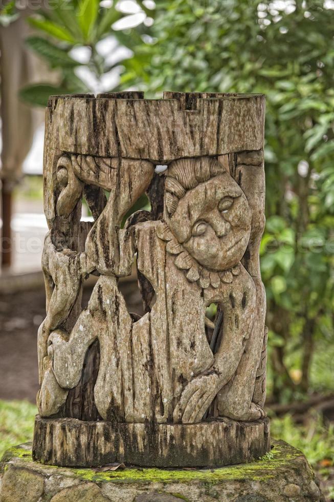 wooden tiki on tropical paradise beach photo