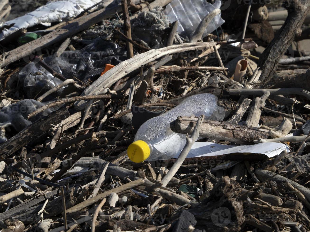 plastic and garbage on the beach photo