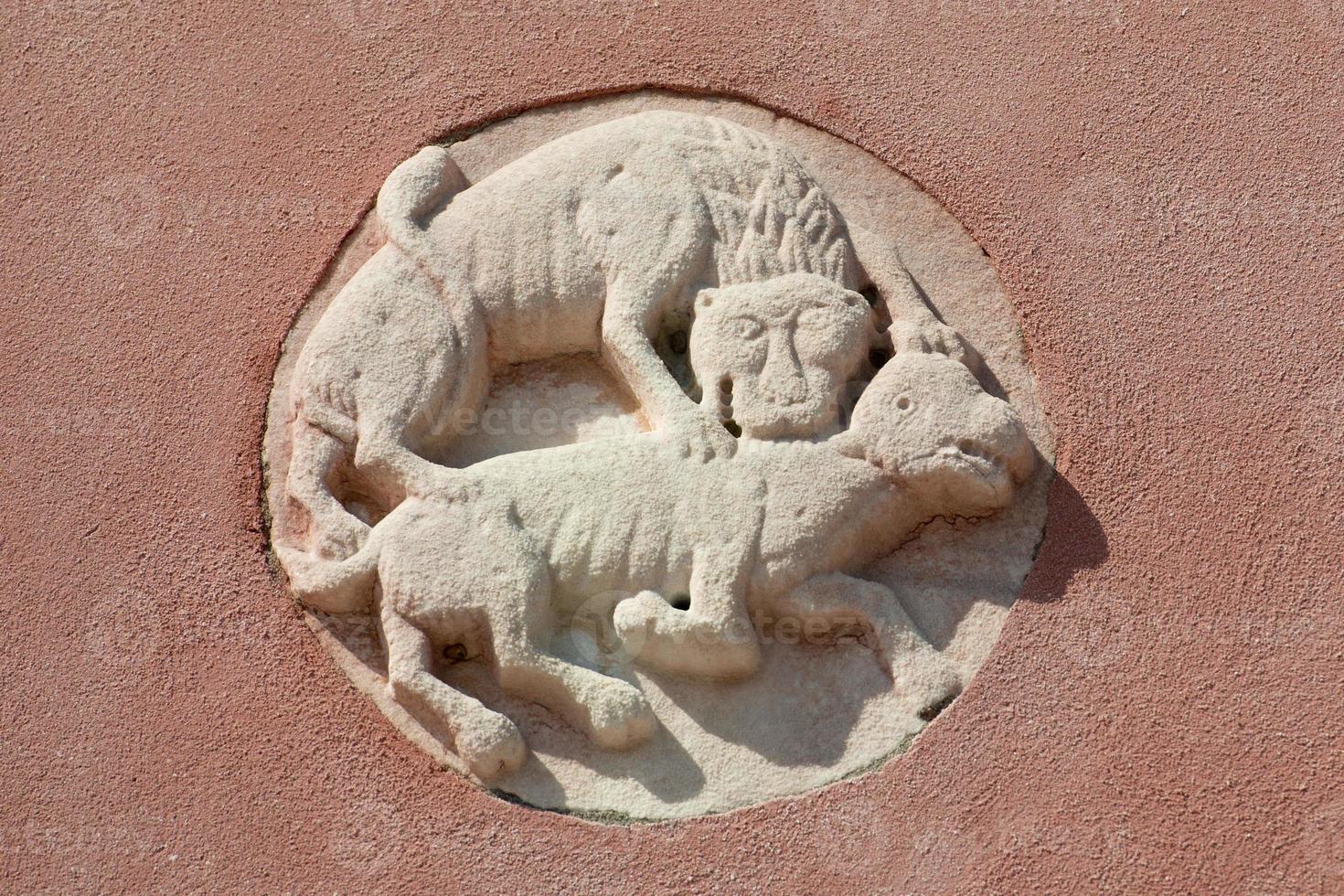 Medieveal bas relief Burano Venice photo