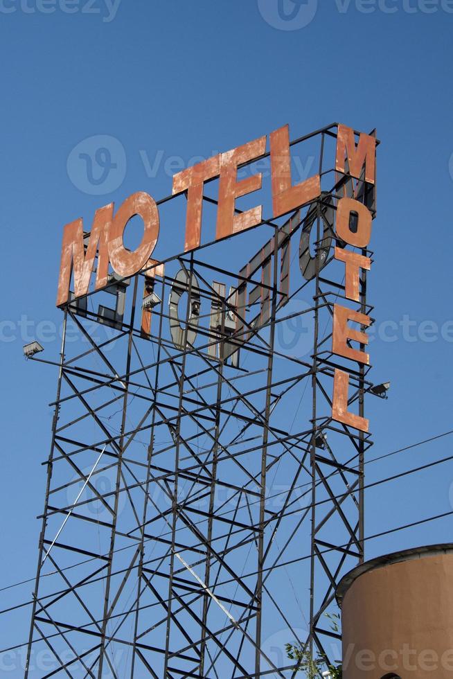 isolated motel rusted sign photo