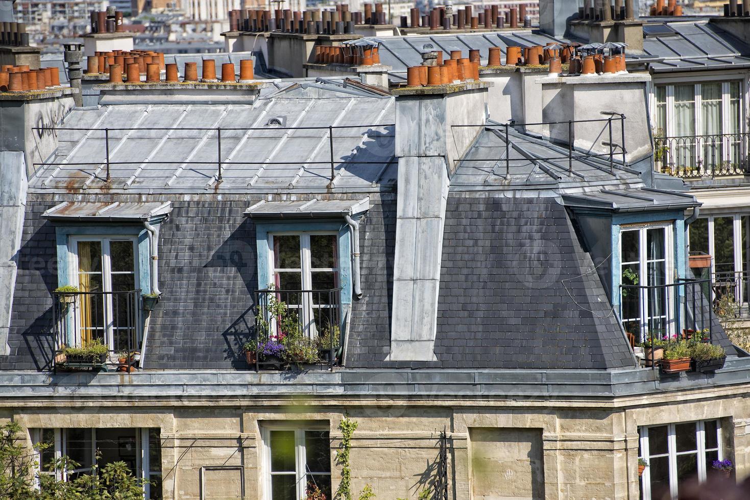 paris roofs and cityview photo