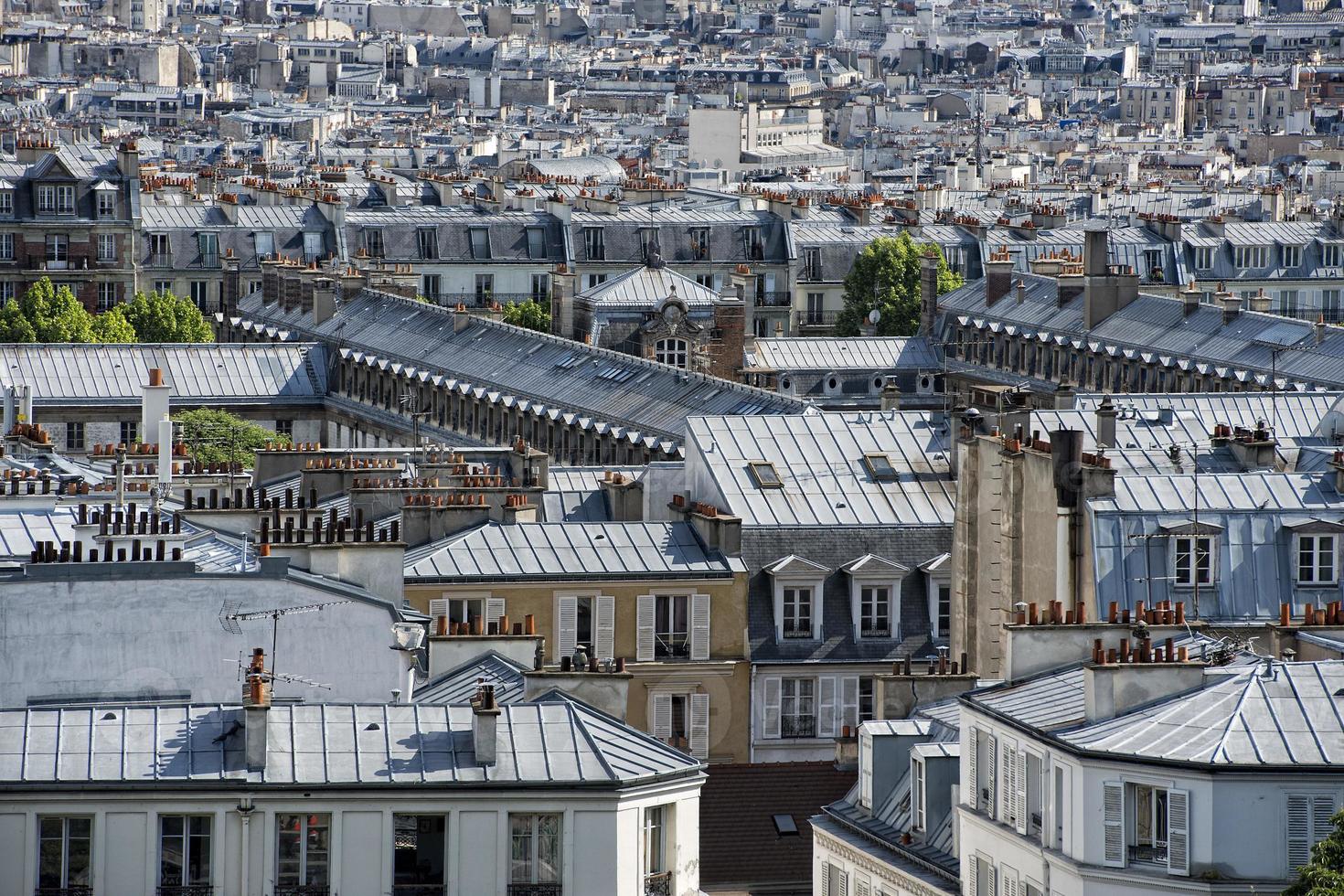 paris roofs and cityview photo