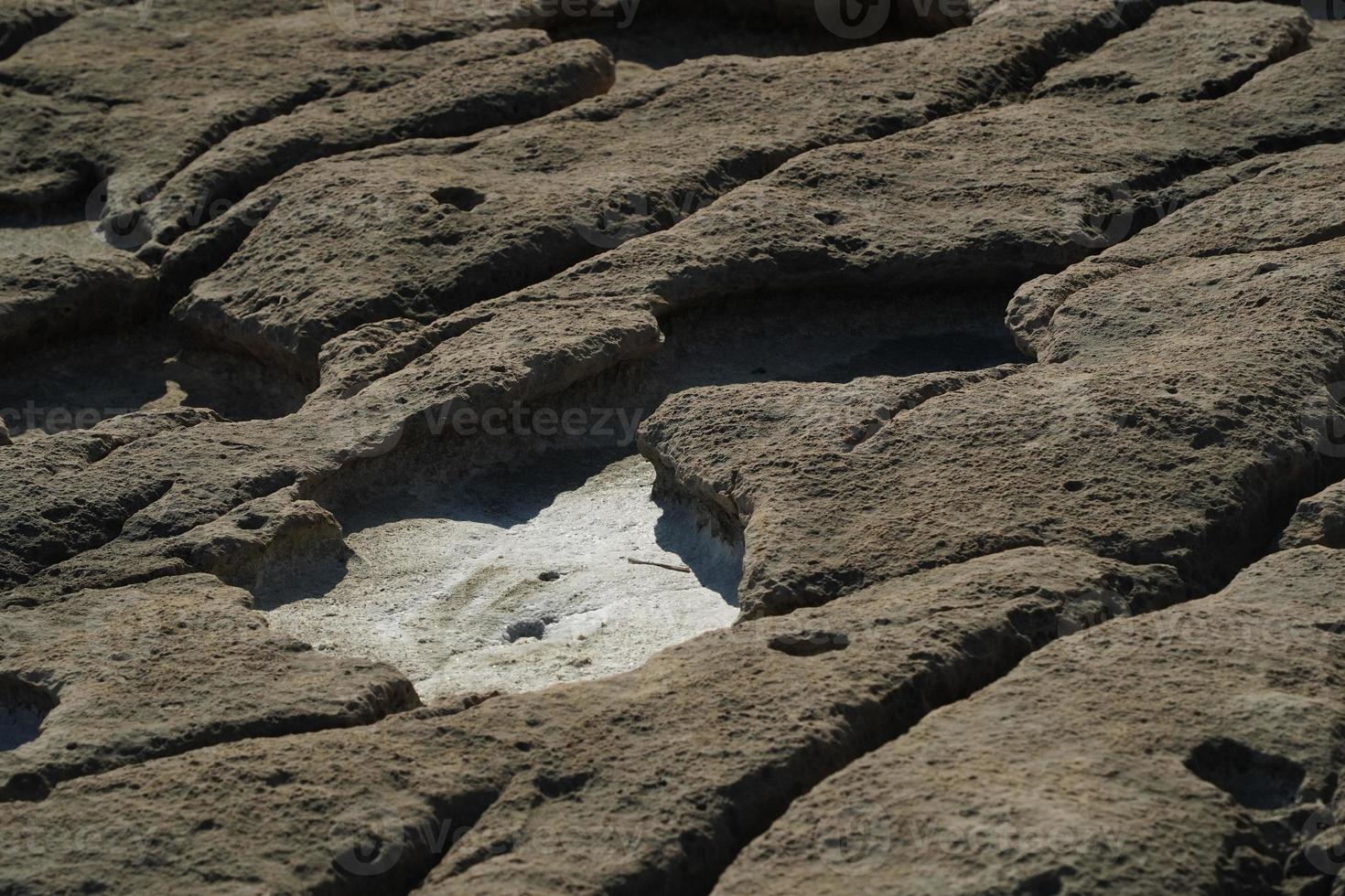 saint peter pools Malta rock formation hole on rocks photo