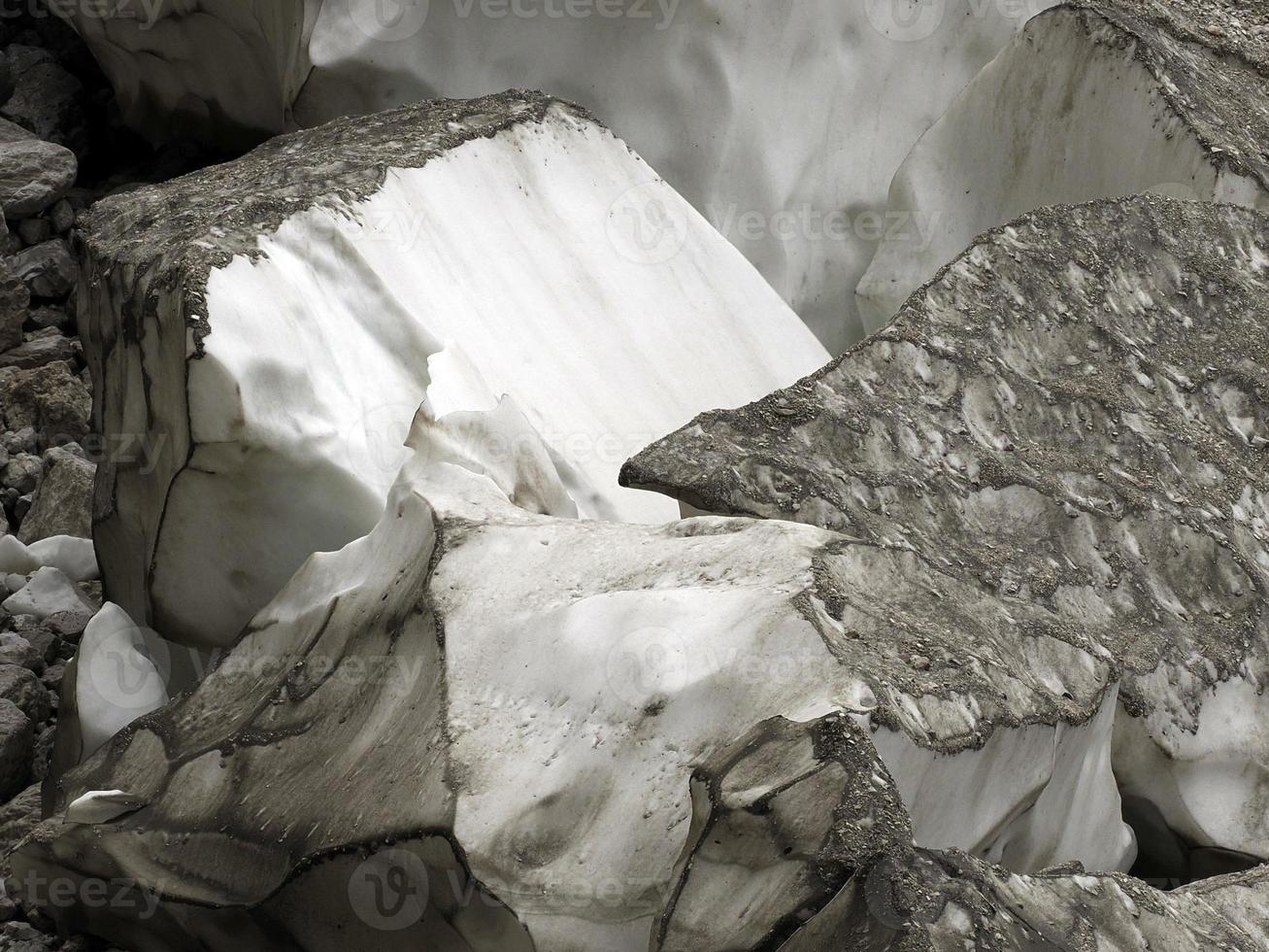 The view of workers cover Marmolada glacier during summer time preventing ice melting, Trentino-Alto Adige, Italy. photo