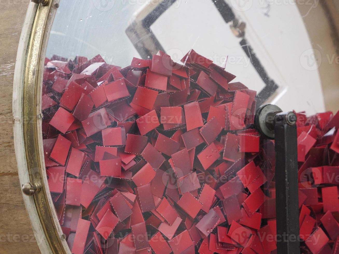 lottery red tickets inside ballot draw riffle machine photo