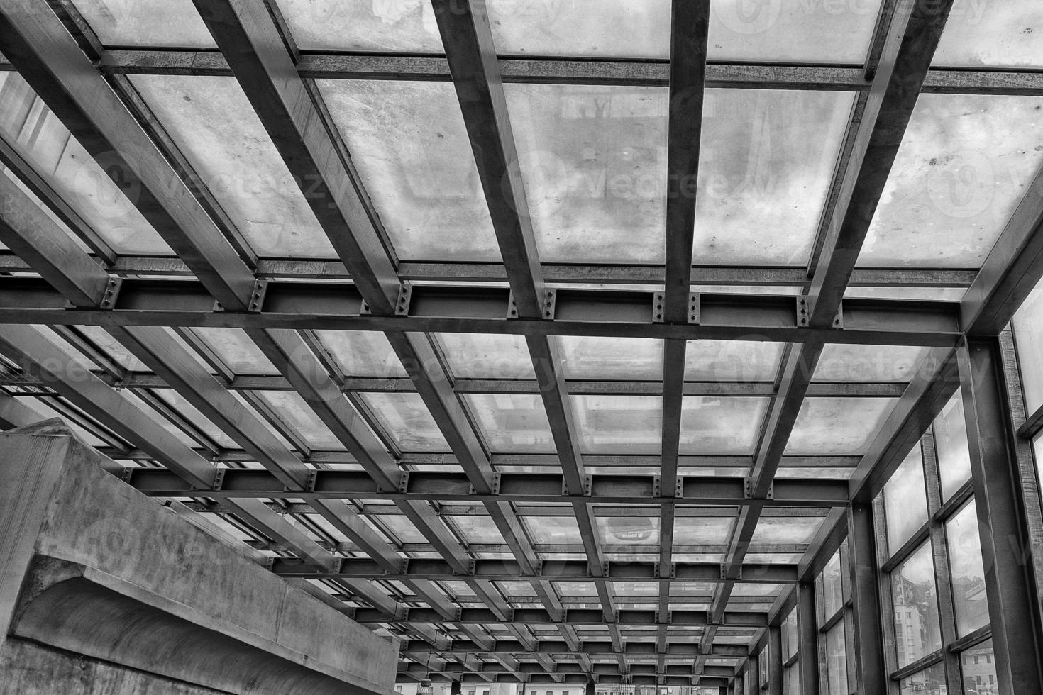 metallic building framework in black and white photo