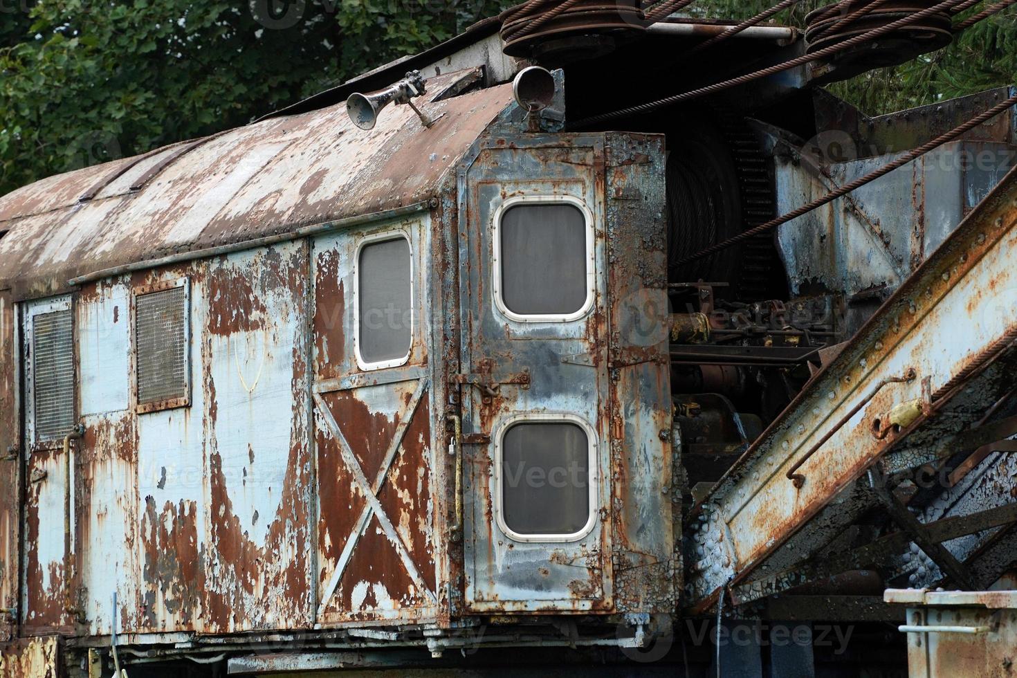 old rusted train crane abandoned photo