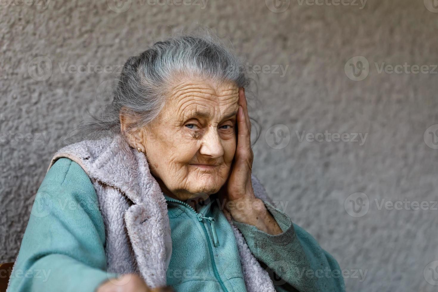 Portrait of a very old wrinkled woman photo