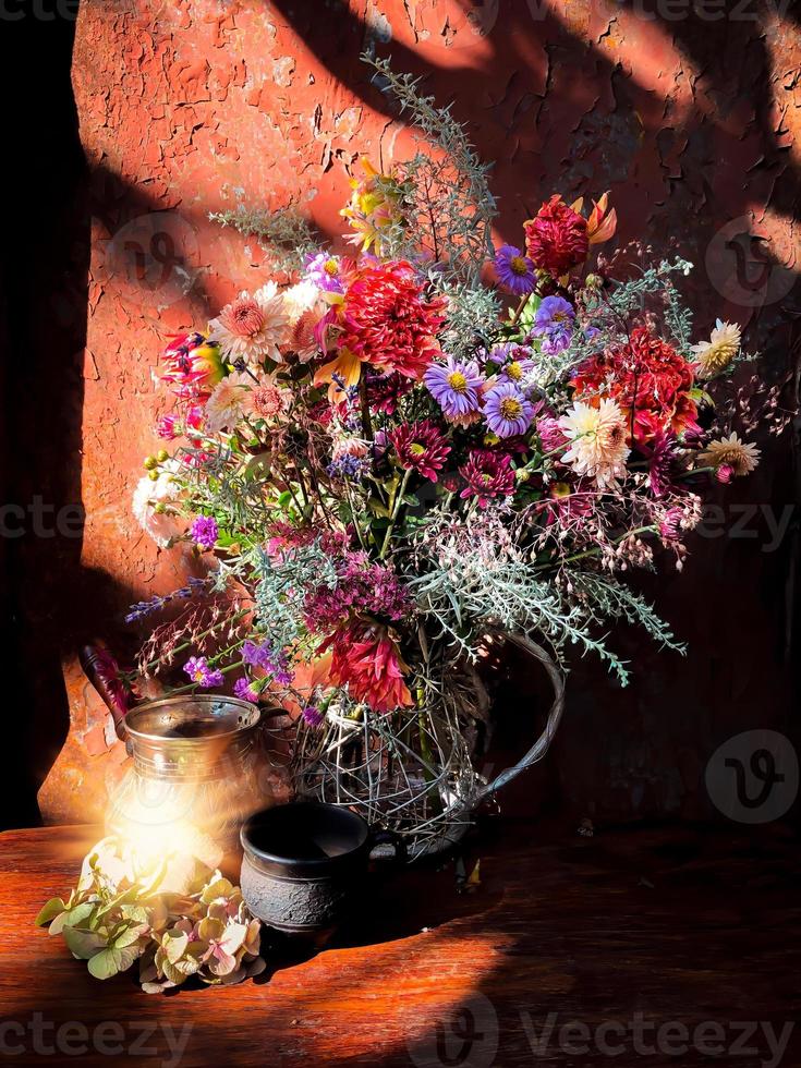 Romantic bouquet with flowers of dahlia, chrysanthemum, perennial aster, montbrecia photo