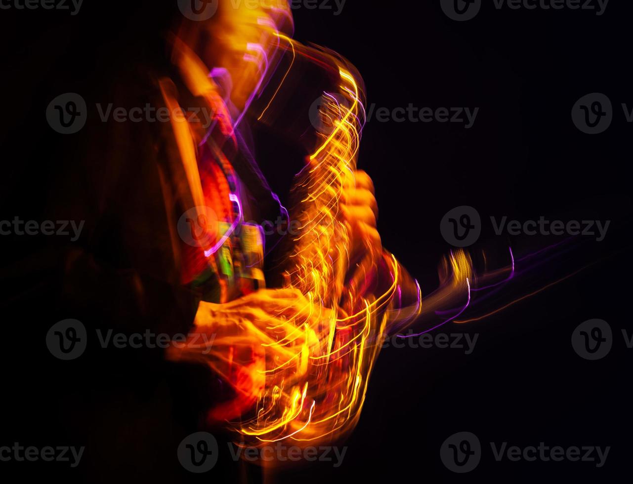 Saxophone player performing on stage photo