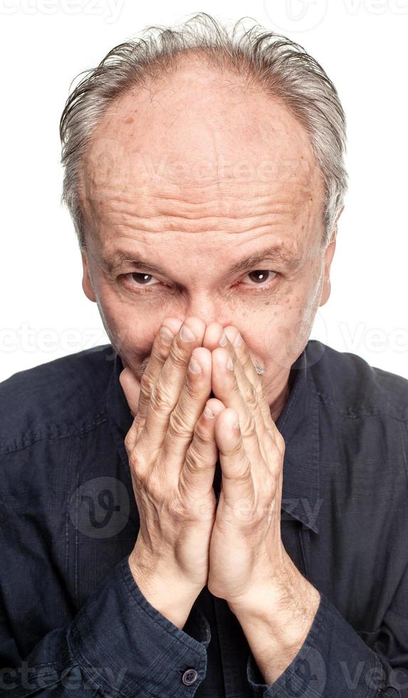 Elderly man on white photo