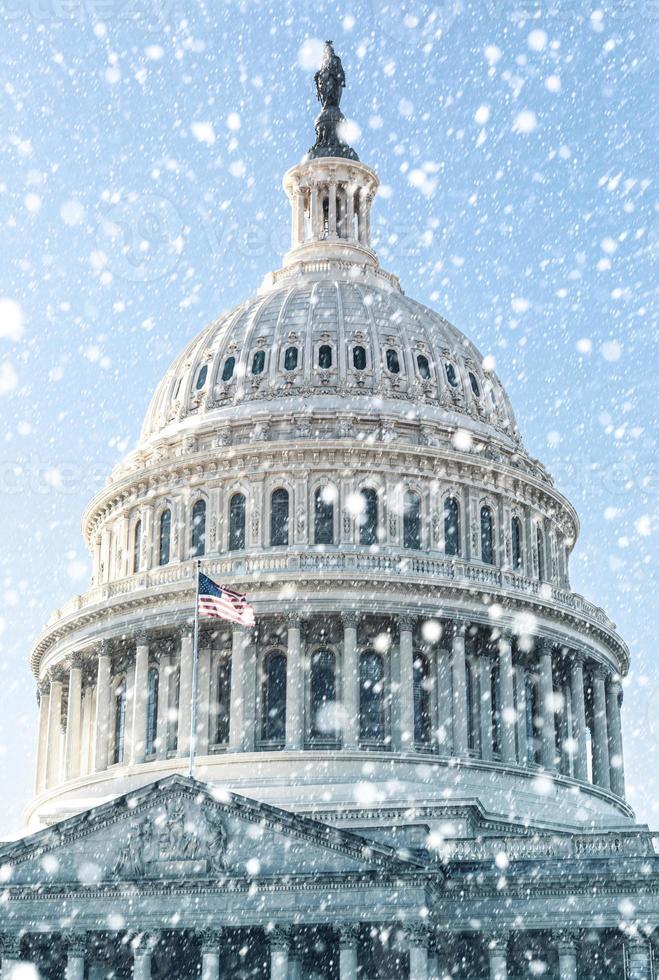 Capitol building in Washington D.C. during snow storm photo