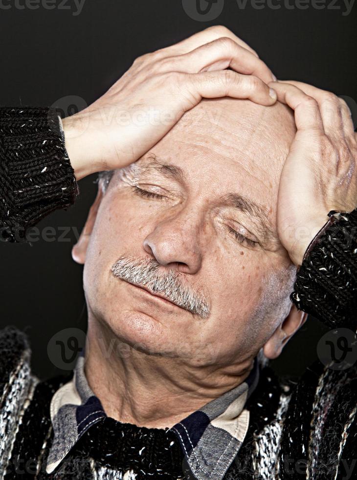 Old man headache photo