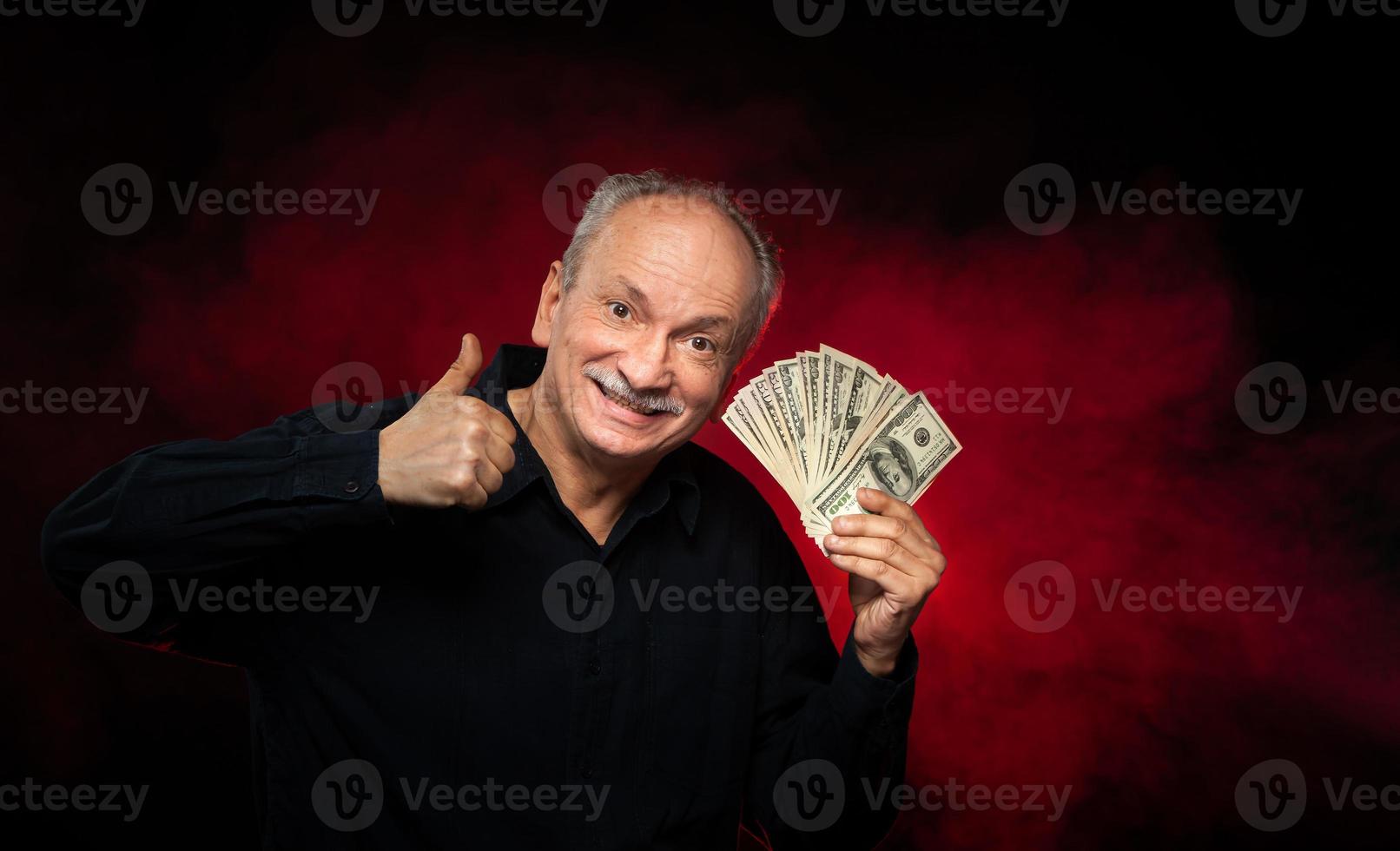 old man with dollar bills photo