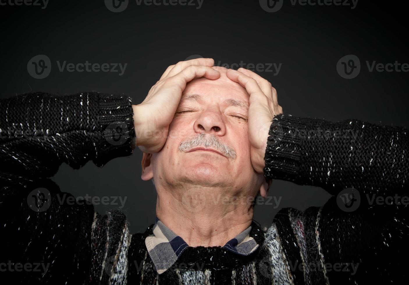 Old man headache photo