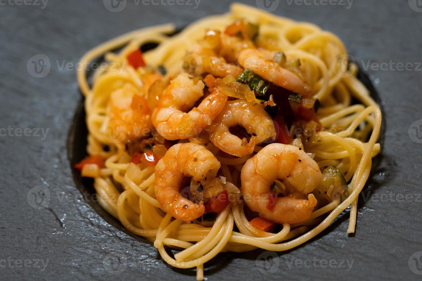 Spaghetti alla busara pasta with shrimps an Italien specialty photo