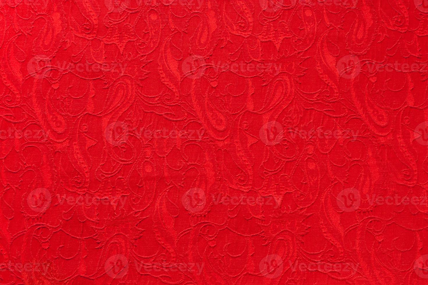 rojo hermoso tejido étnico paisley adornado. foto