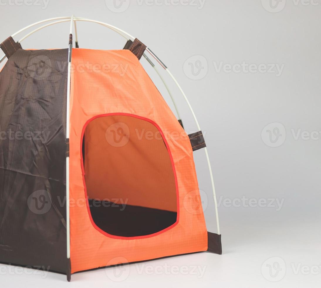 empty orange pet tent isolated on white background. photo