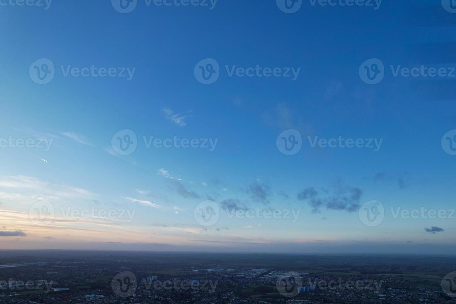 Beautiful Clouds During Sunset over City photo