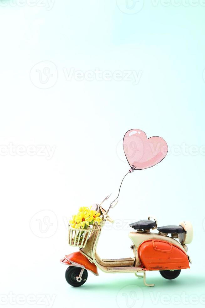 Saint Valentine card, vintage scooter with hert balloon photo