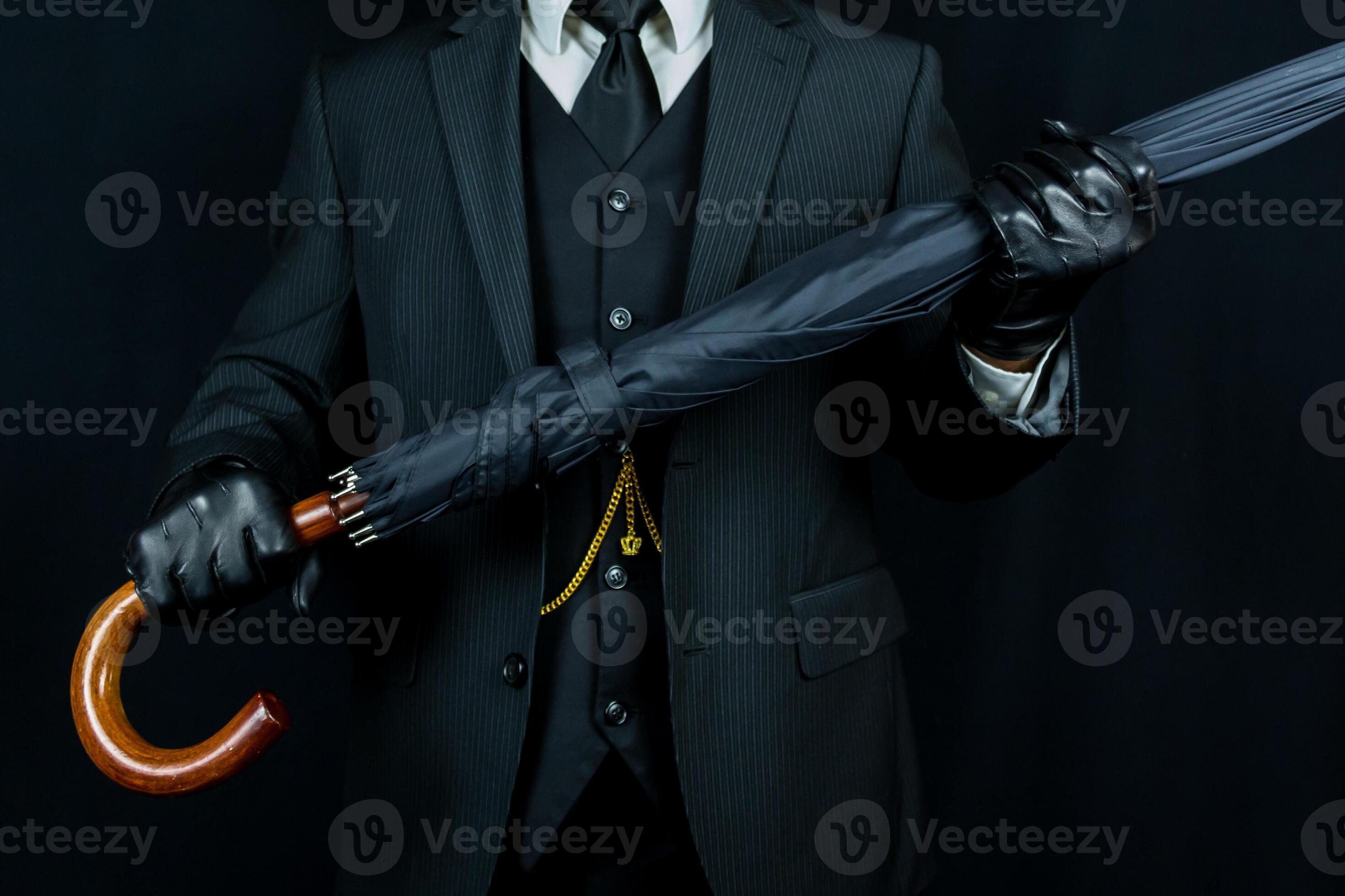 Portrait of Man in Dark Suit and Leather Gloves Holding Umbrella Like a