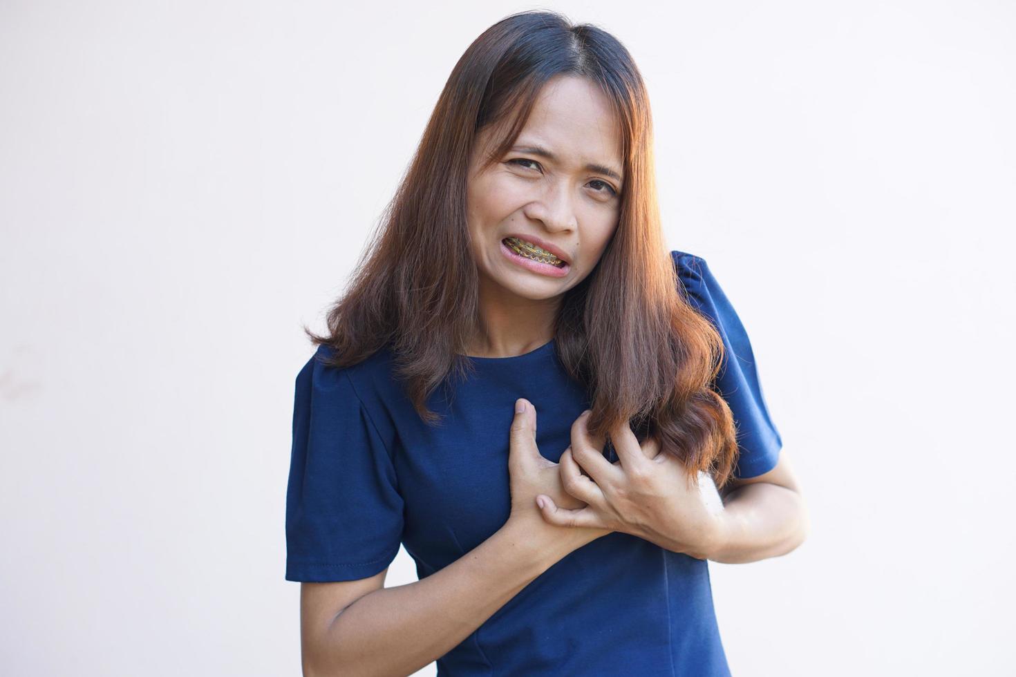 Asian women have tightness in the chest. photo