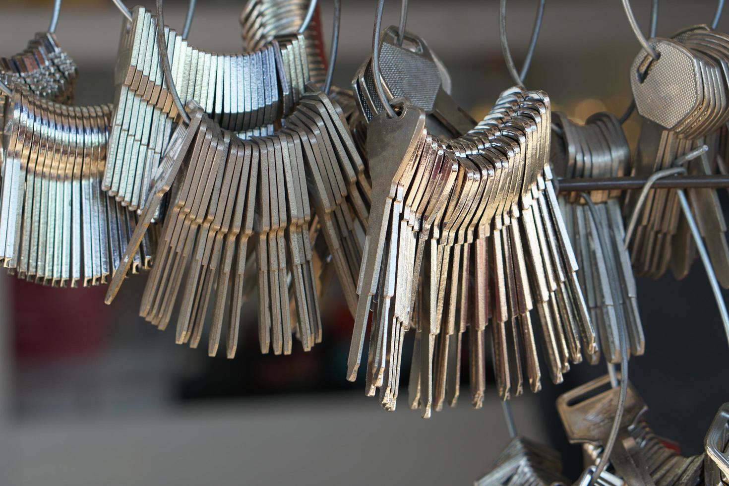 Lots of keys hang in the tool cabinet. photo