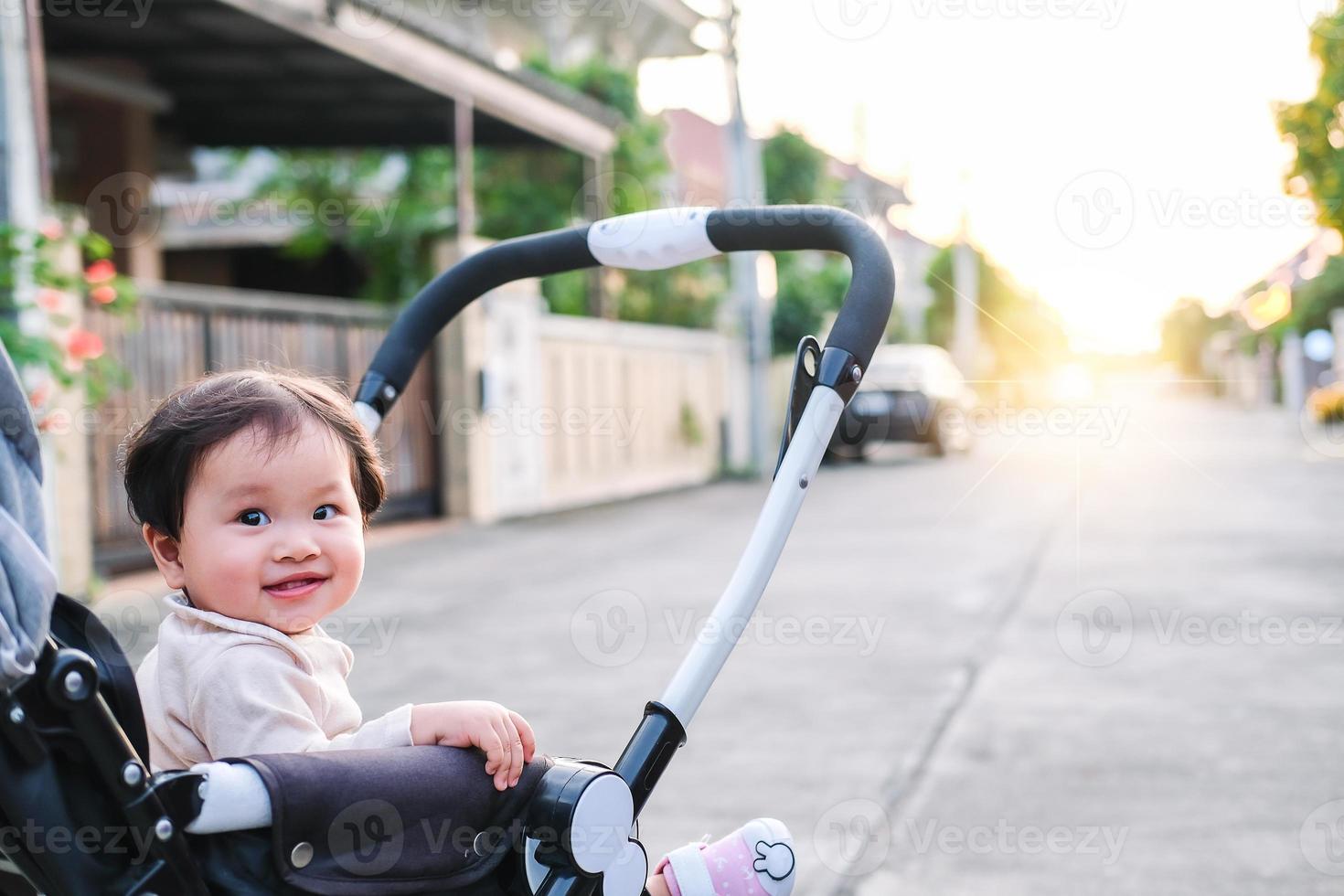 Asian newborn baby kid eye contact with mom cuteness of children with happy family on soft mattress metaphor living life healthy lifestyle cute of kid baby products health products for mother and baby photo