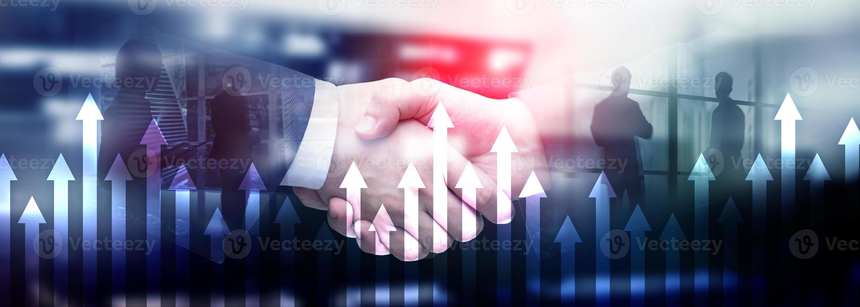 Up arrow graph on skyscraper background. Invesment and financial growth concept. photo