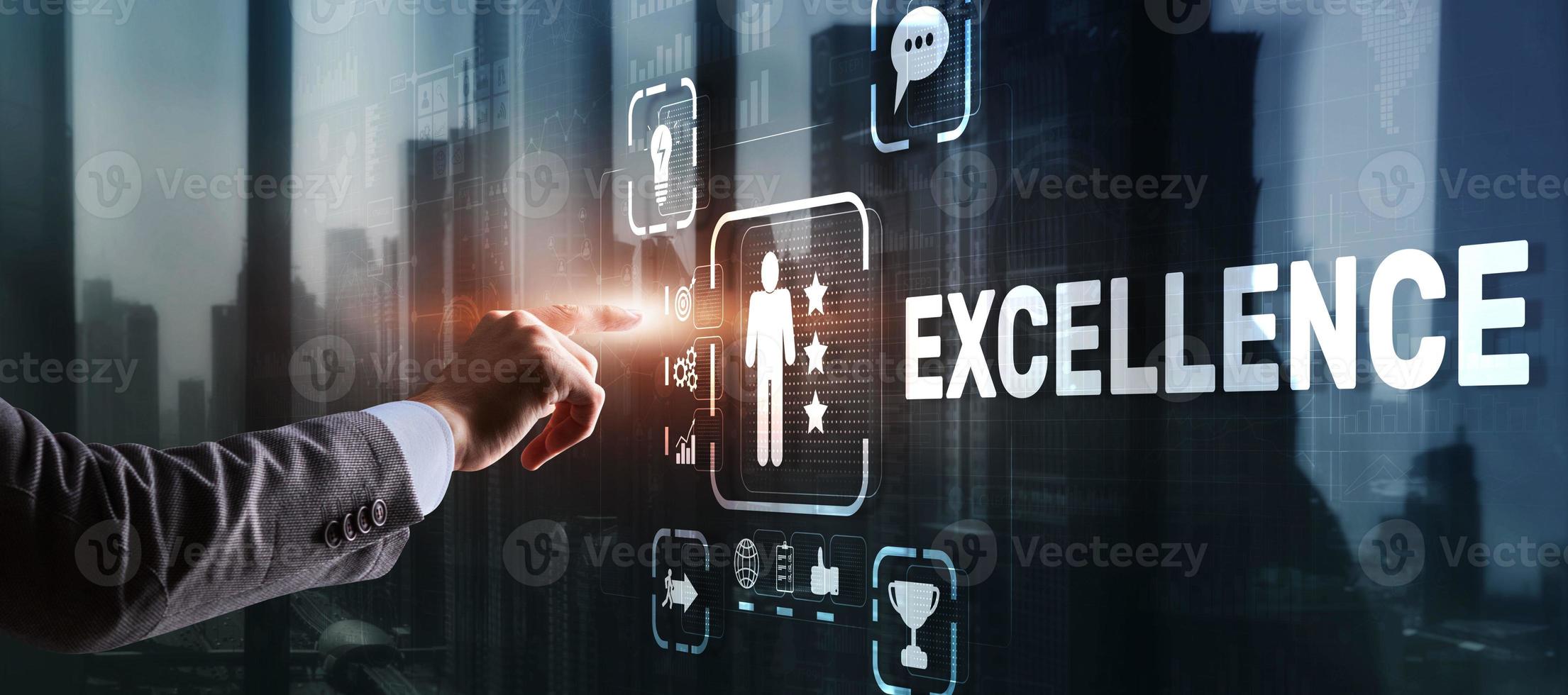 Excellence Concept. Quality Service. Businessman pressing Excellence virtual screen photo
