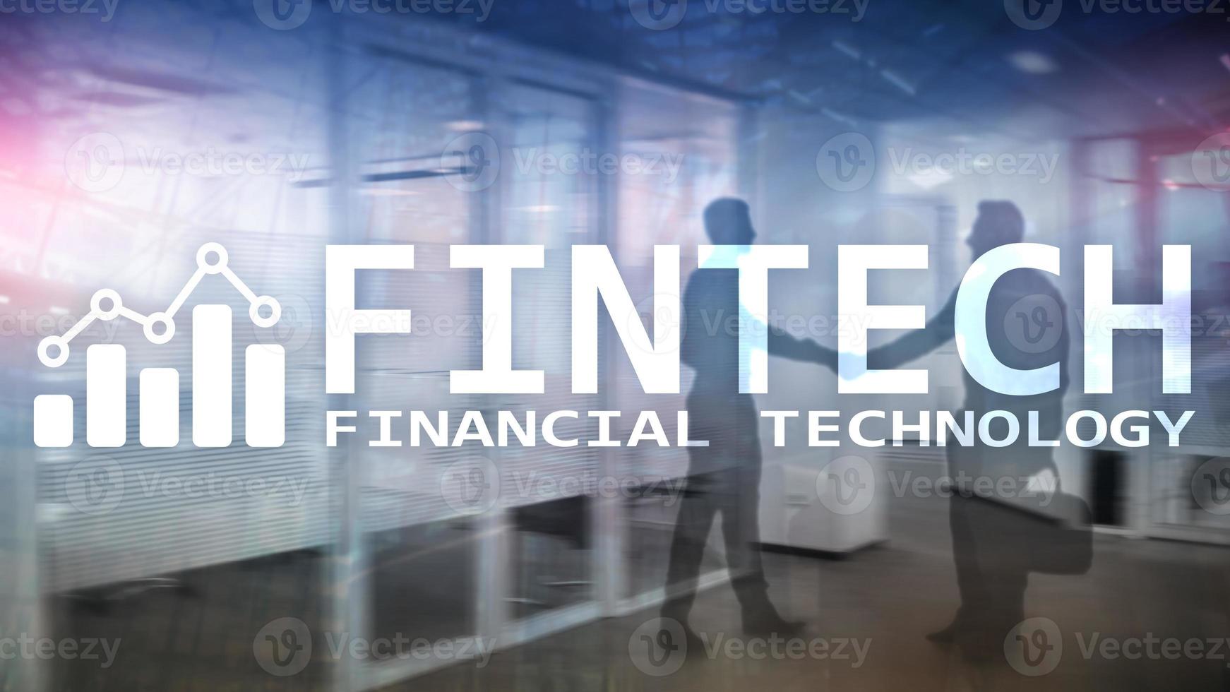 FINTECH - Financial technology, global business and information Internet communication technology. Skyscrapers background. Hi-tech business concept. photo