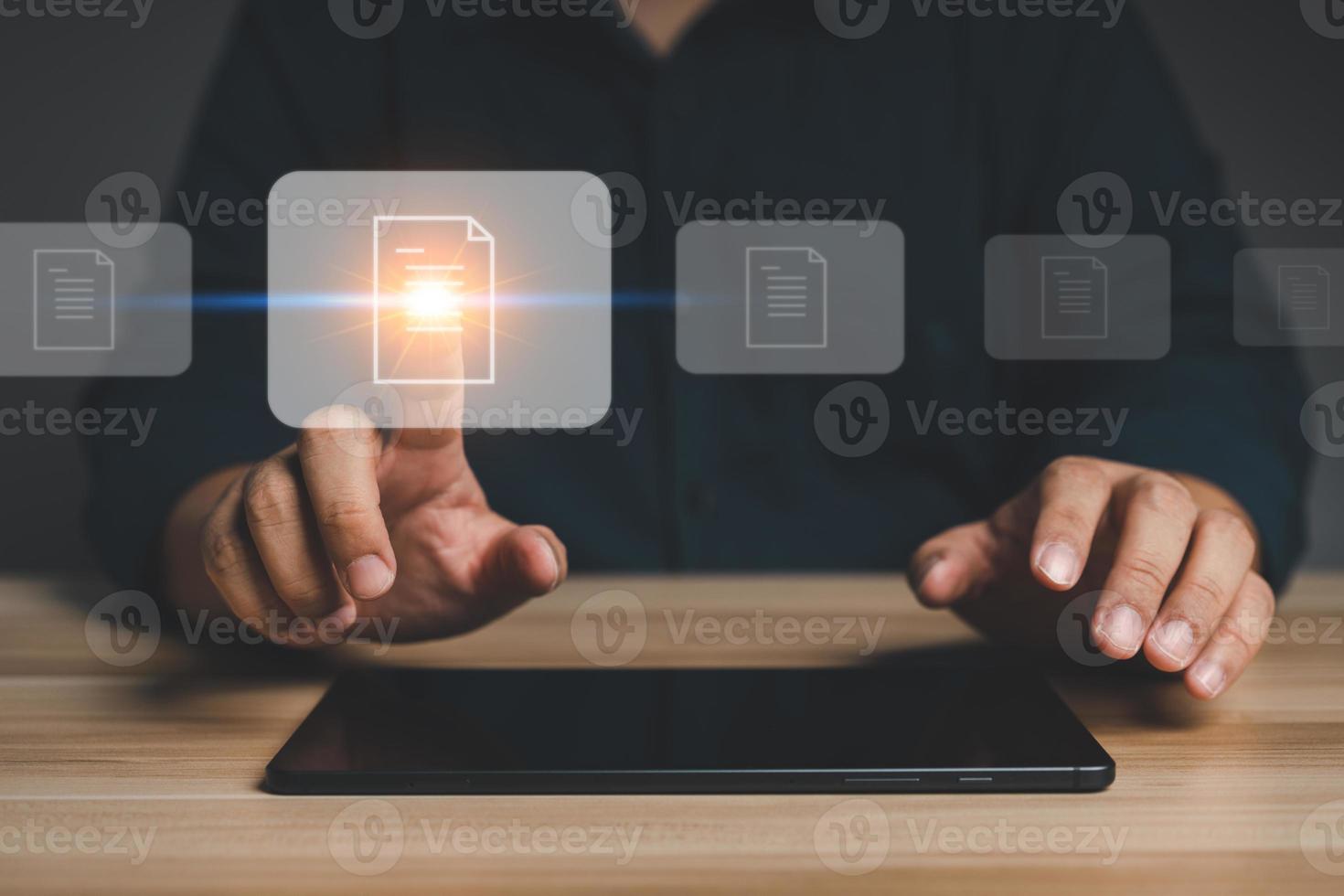 Businessman working on virtual screen of Document Management System DMS. Software for archiving, searching, and managing corporate files and information, documentation in enterprise with ERP. photo