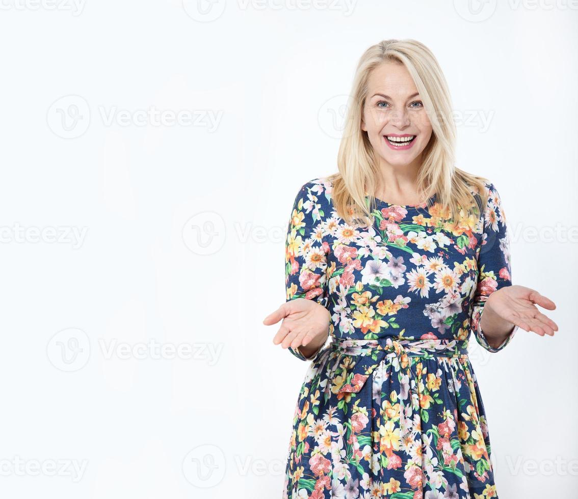 Surprised woman over white background. Human face expression, emotions, feeling attitude reaction photo
