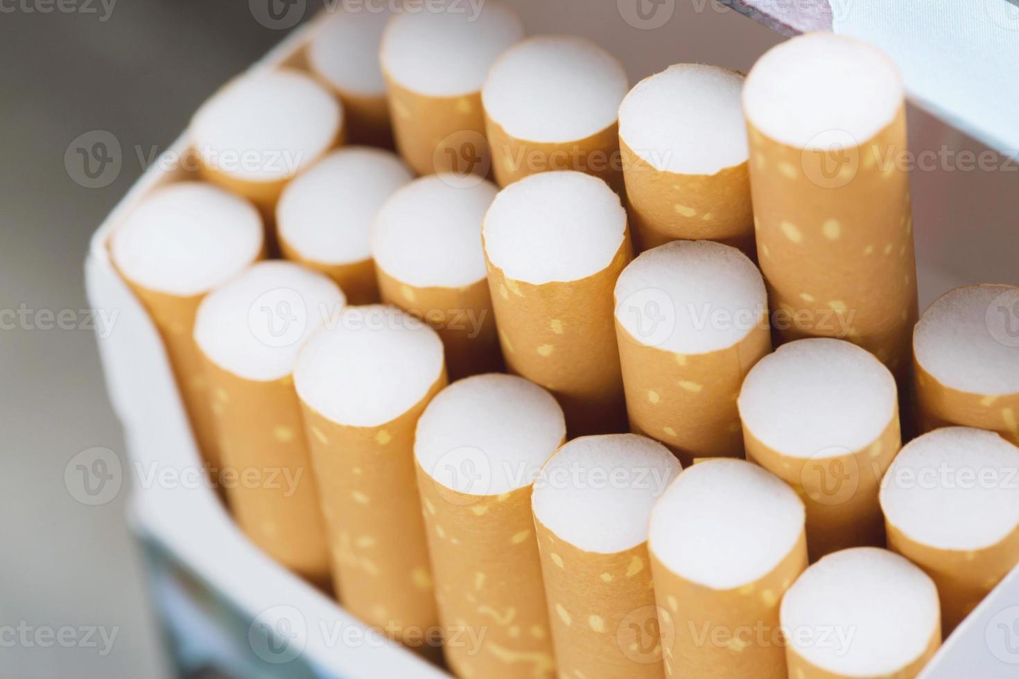 peel it off Cigarette pack prepare smoking a cigarette. Packing line up.  photo filters Natural light.