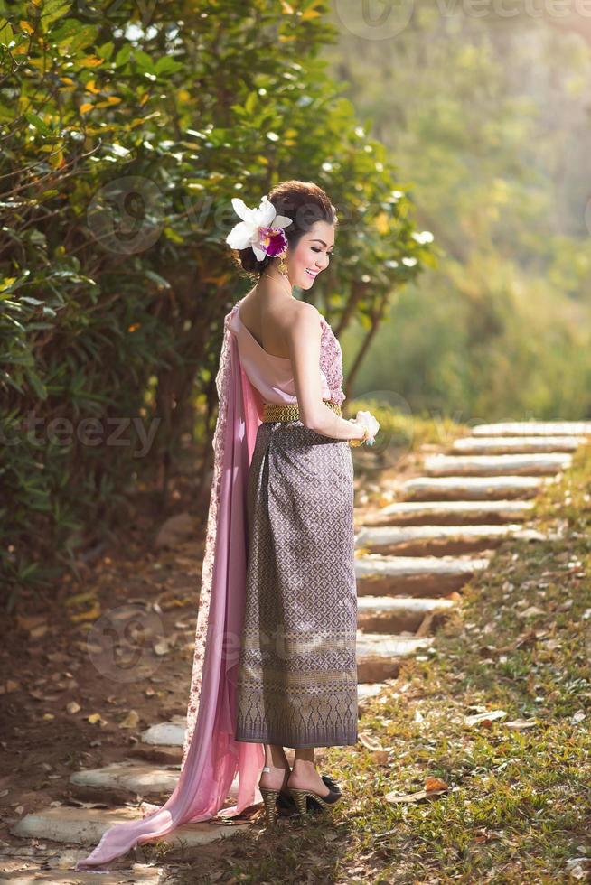 Beautiful Thai girl in Thai traditional costume photo