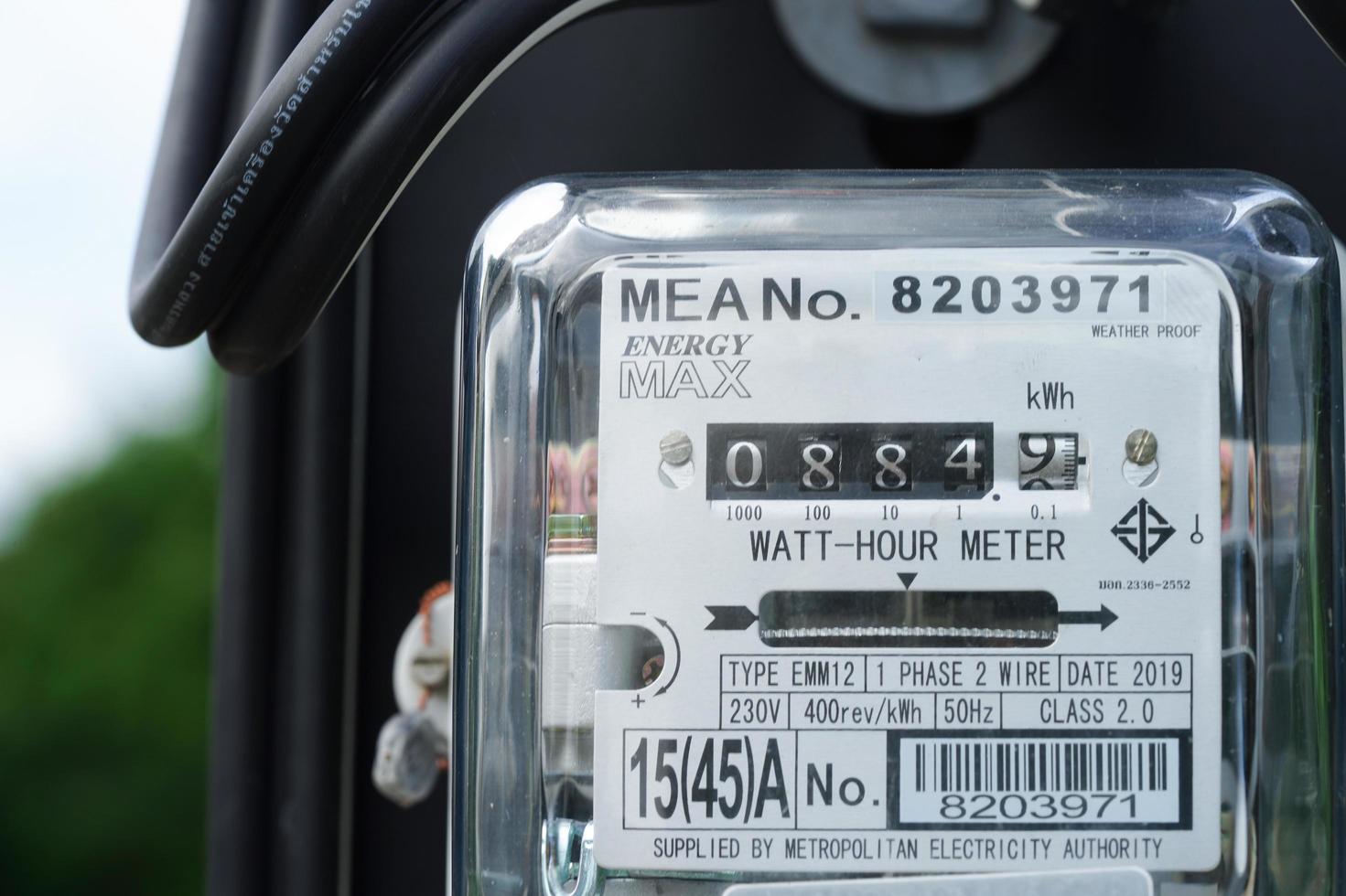 Bangkok, Thailand - May 15, 2022 Electric measuring power meter for energy cost at home and office. photo