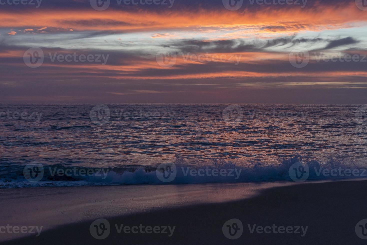 pacific ocean beach sunset in todos santos baja california mexico photo