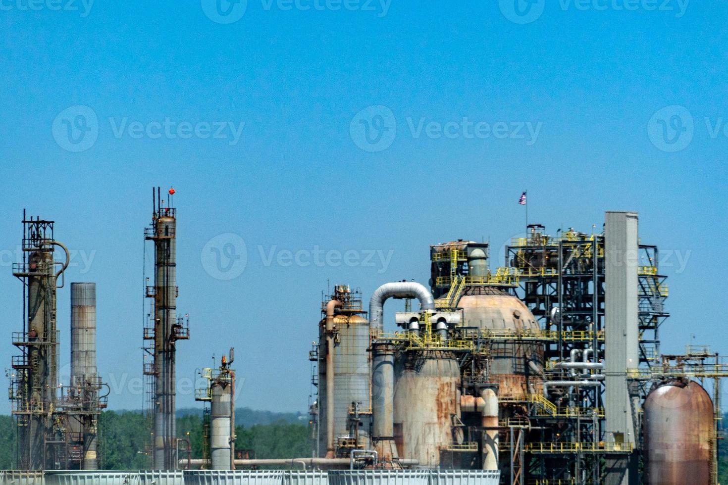 oil refinery smoking chimney detail photo